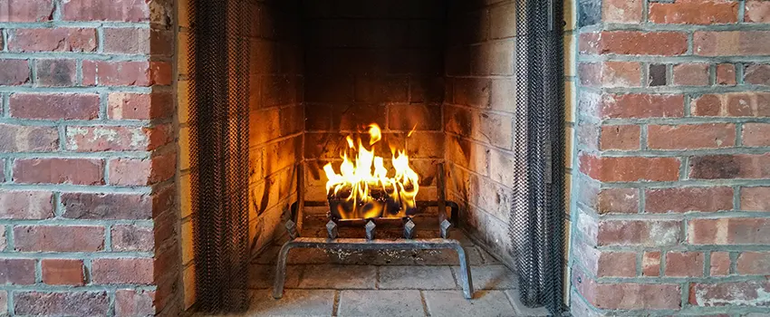 Repairing Damaged Fireplace Tiles in Bettendorf, Iowa